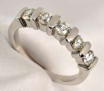 Stylish 1 Ct. T.w. WG Channel Set Band