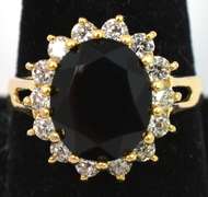 Striking Black Garnet and CZ Halo Ring in Yellow Gold