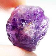 Collectors rich untreated 19.43ct uncut Amethyst