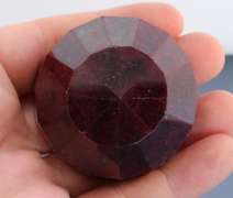 Impressive 717ct rich violet red Ruby