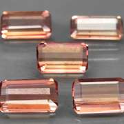 Dynamic 3.65ct Padparadscha Tourmaline set