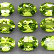 Dazzling 7.40ct untreated lime green Peridot set