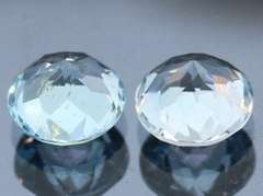 Heavy 5.02ct vivid sky blue Topaz set