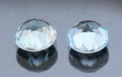 Heavy 5ct vivid sky blue Topaz set