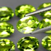 Dazzling 7.40ct untreated lime green Peridot set