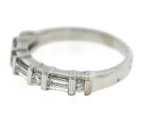Remarkable 14kt WG Baguette and Round Brilliant Cut Diamond Ring