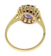 Dreamy Yellow Gold Oval Amethyst Halo Ring