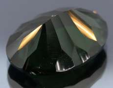 Unique 14.30ct greenish black created Amethyst