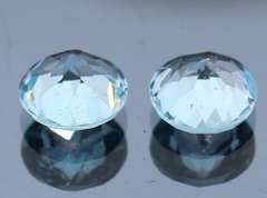 Heavy 4.85ct vivid sky blue Topaz set