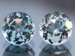 Heavy 5.02ct vivid sky blue Topaz set