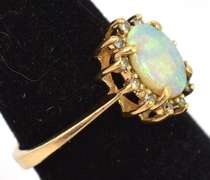 Breathtaking Opal & Diamond Accent Ring in Yellow Gold