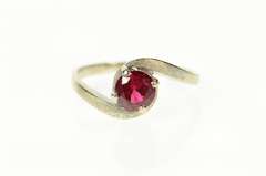 14K White Gold Round Syn. Ruby Solitaire Wavy Bypass Ring