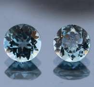 Heavy 4.85ct vivid sky blue Topaz set
