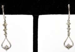 Sparkling Diamond Dangle Earrings in White Gold