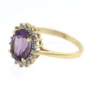 Dreamy Yellow Gold Oval Amethyst Halo Ring