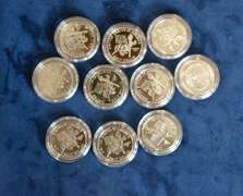 Lot Of 10 Commemorative Half Dollars in Capsule