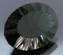 Unique 14.30ct greenish black created Amethyst