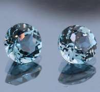 Heavy 4.85ct vivid sky blue Topaz set