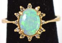 Breathtaking Opal & Diamond Accent Ring in Yellow Gold