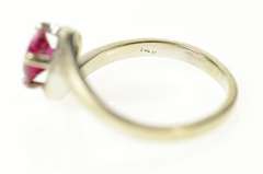 14K White Gold Round Syn. Ruby Solitaire Wavy Bypass Ring