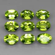 Dazzling 7.40ct untreated lime green Peridot set