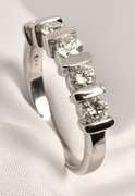 Stylish 1 Ct. T.w. WG Channel Set Band