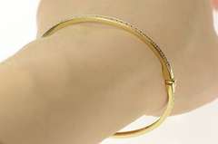 14K Yellow Gold Classic Oval Bangle Channel Cubic Zirconia Bracelet