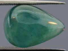 Eye catching 7.31ct blue green Grandidierite cabochon