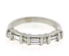 Remarkable 14kt WG Baguette and Round Brilliant Cut Diamond Ring
