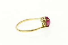 10K Yellow Gold Oval Syn. Pink Star Ruby Cabochon Swirl Ring