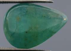 Eye catching 7.31ct blue green Grandidierite cabochon