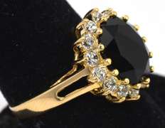 Striking Black Garnet and CZ Halo Ring in Yellow Gold