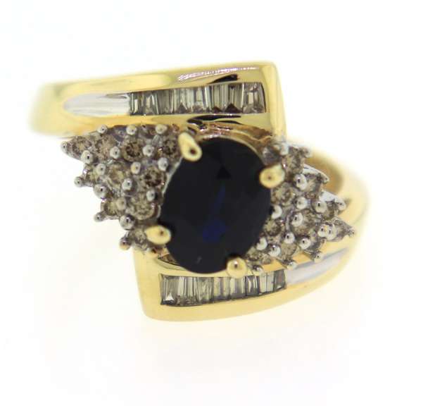 Wonderful Yellow Gold Oval Sapphire and Diamond Baguette Ring