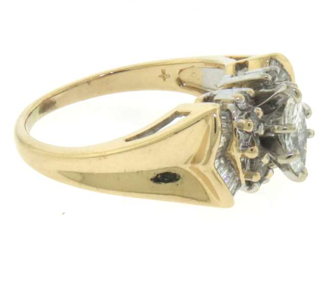 Dazzling Yellow Gold Marquise Baggeutte Engagement Ring