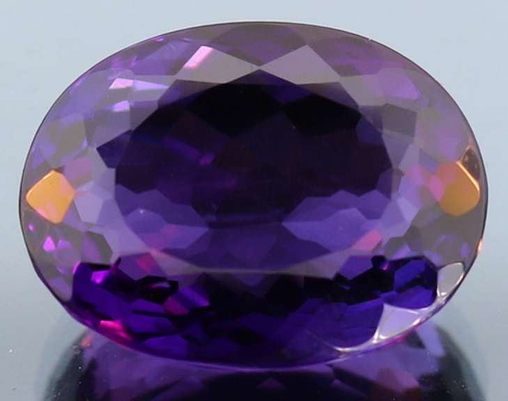 Oval cut 29.04ct deep purple created Amethyst