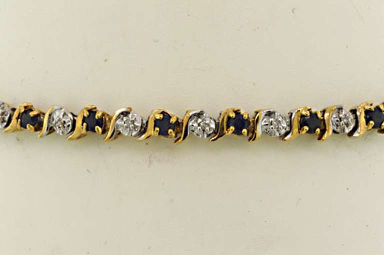 Stately 10kt Saphhire and Diamond S-Link Tennis Bracelet