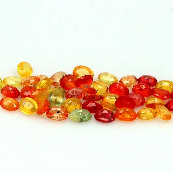 9.46ct heated only Autumn leaves Sapphire set