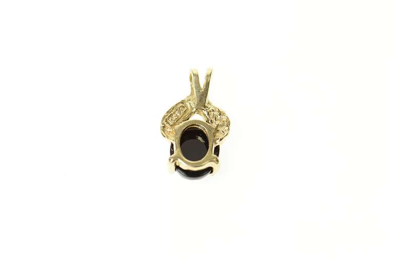 10K Yellow Gold Oval Black Onyx Black Hills Leaf Simple Pendant