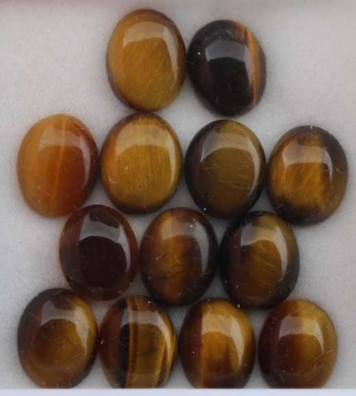 Untreated 31.28ct full cats eye Tigers Eye set