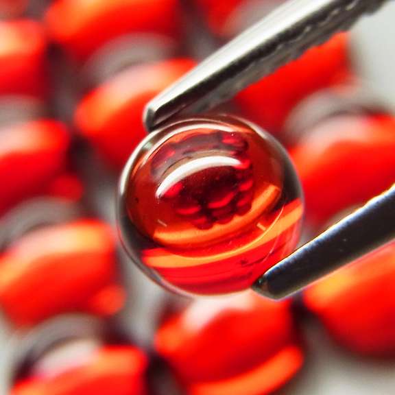 Gorgeous red amber 12.18ct 15pc Garnet set