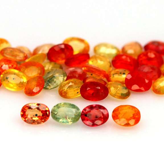 9.46ct heated only Autumn leaves Sapphire set