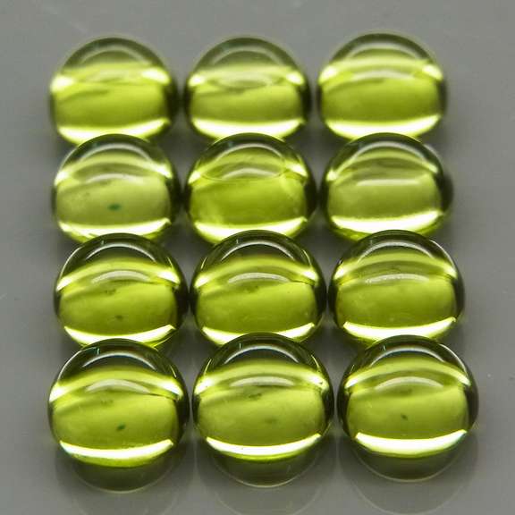 Gorgeous 7.85ct 12pc lime green Peridot set