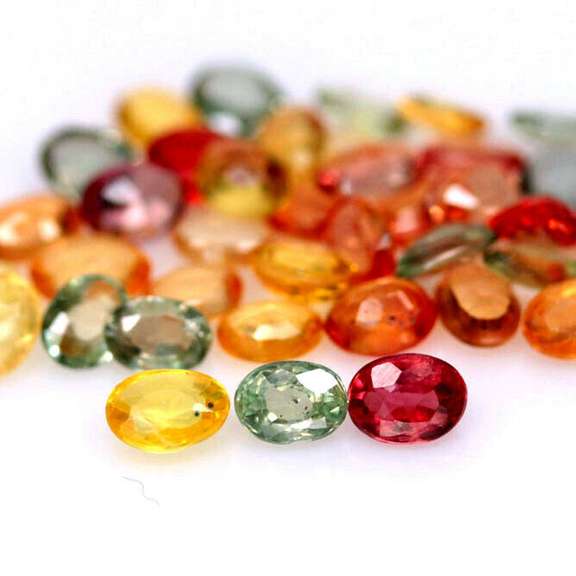 Heated only! 6.99ct fancy color Sapphire set