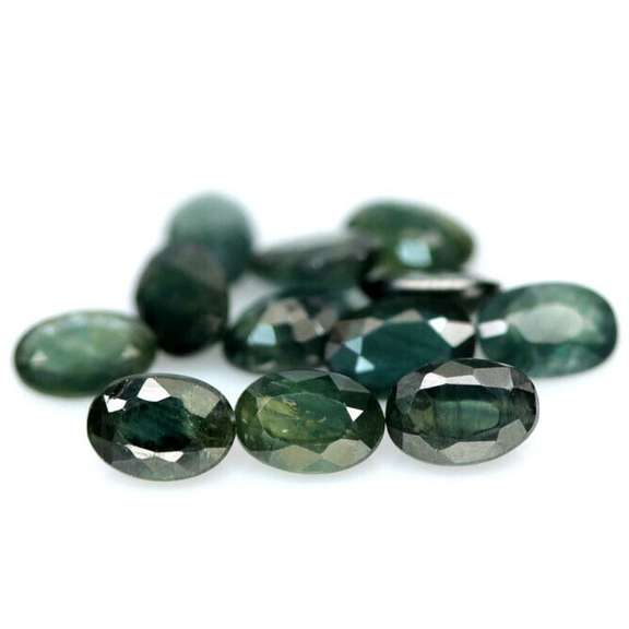 Heated only! 7.10ct blue green Sapphire set