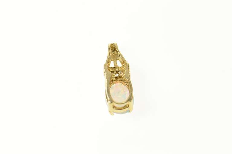 10K Yellow Gold Oval Syn. Opal CZ Accent Statement Pendant