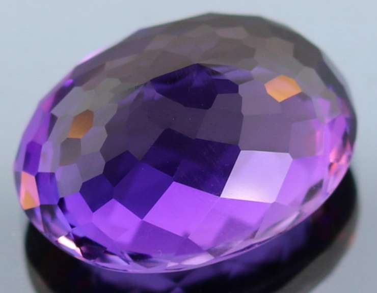 Oval cut 29.04ct deep purple created Amethyst