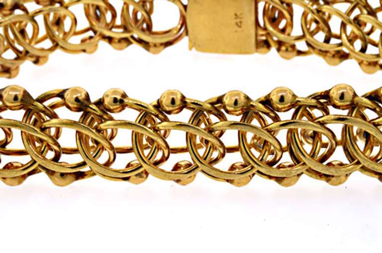 Charming 14kt Yellow Gold Interlocking Multi-Link Bracelet