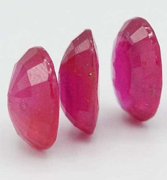 2 OVAL AND 1 ROUND VIOLET RED CUT RUBY