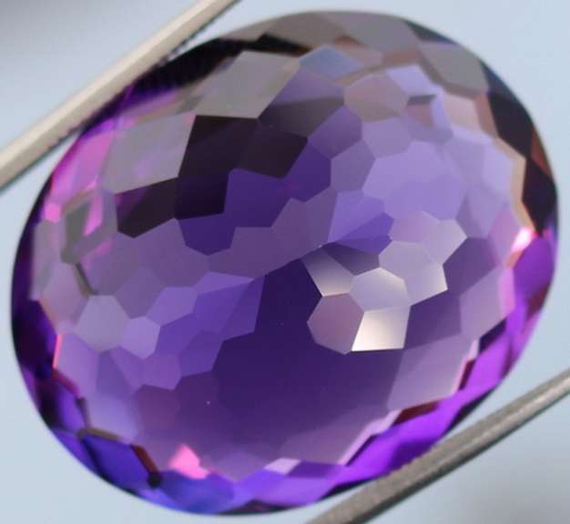 Oval cut 27.4ct royal purple created Amethyst