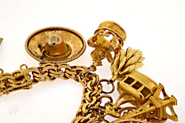 14KT Gold Bracelet with 18KT Gold Charms
